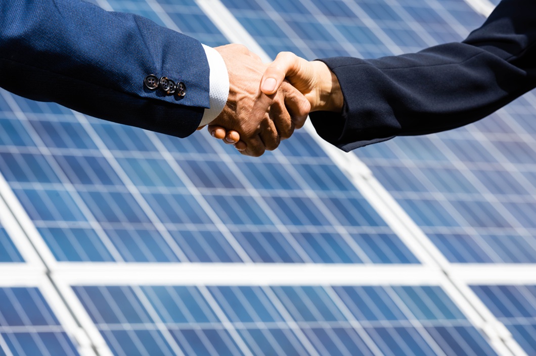 businessmen shaking hands as a symbol of their investment agreement