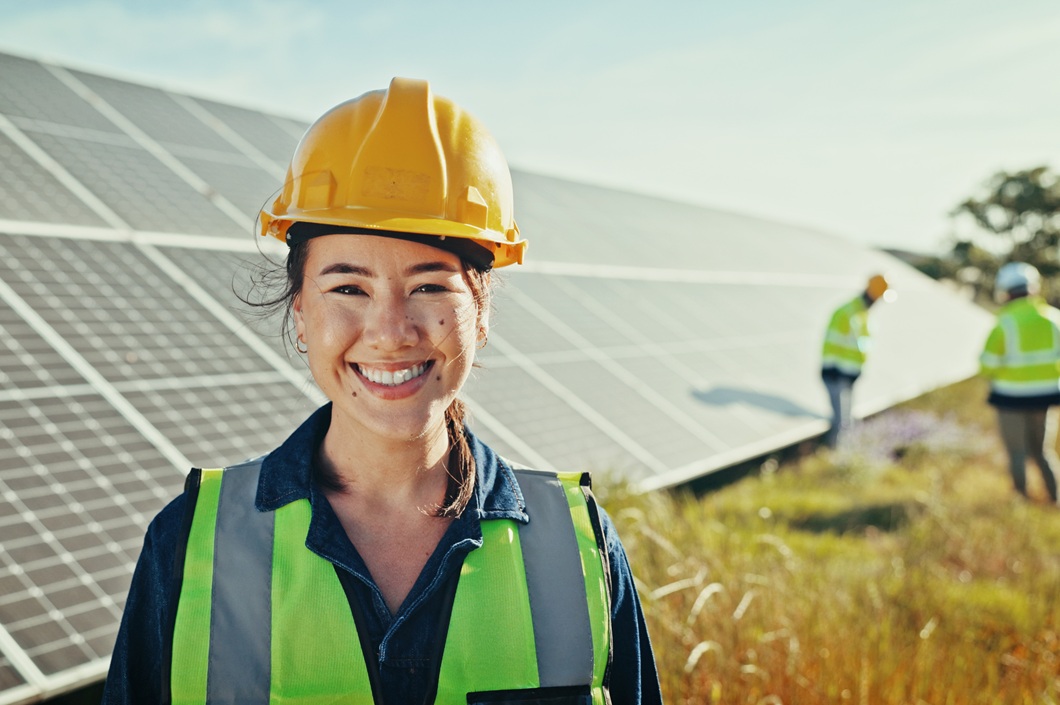 engineers working on the maintenance of solar panels